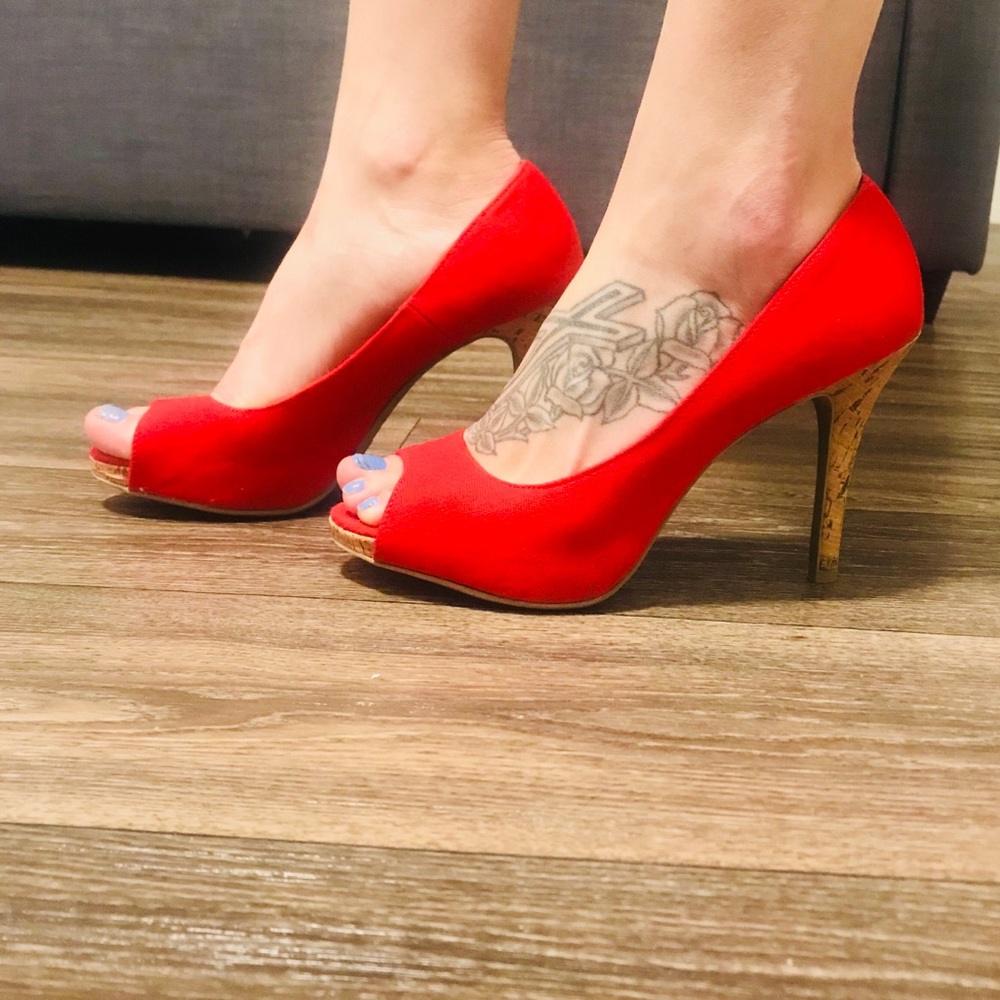 Christian Siriano red heels